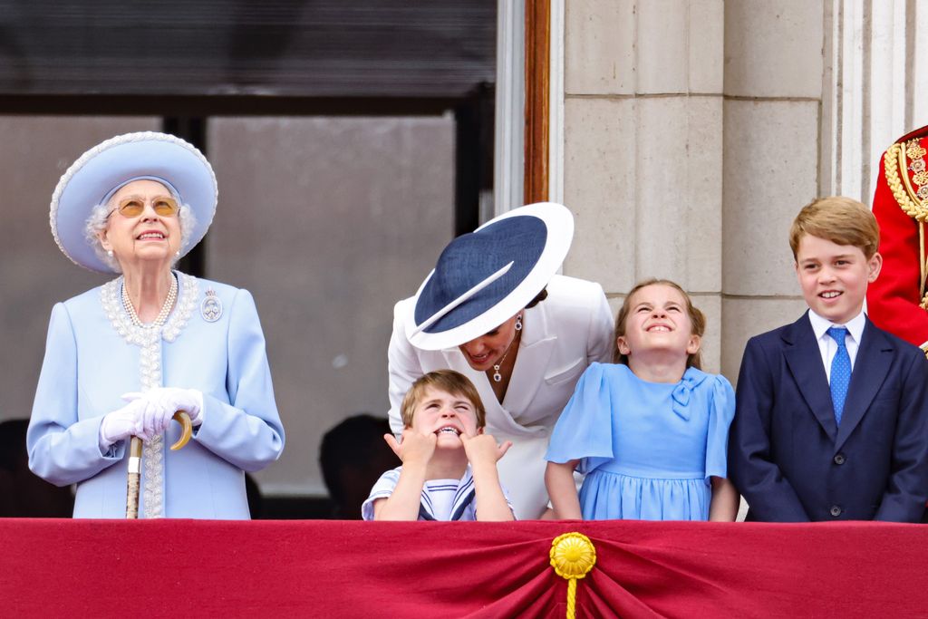Queen Elizabeth II, Prince Louis of Cambridge, Catherine, Duchess of Cambridge and Princess Charlotte of Cambridge on the balcony for Trooping The Colour