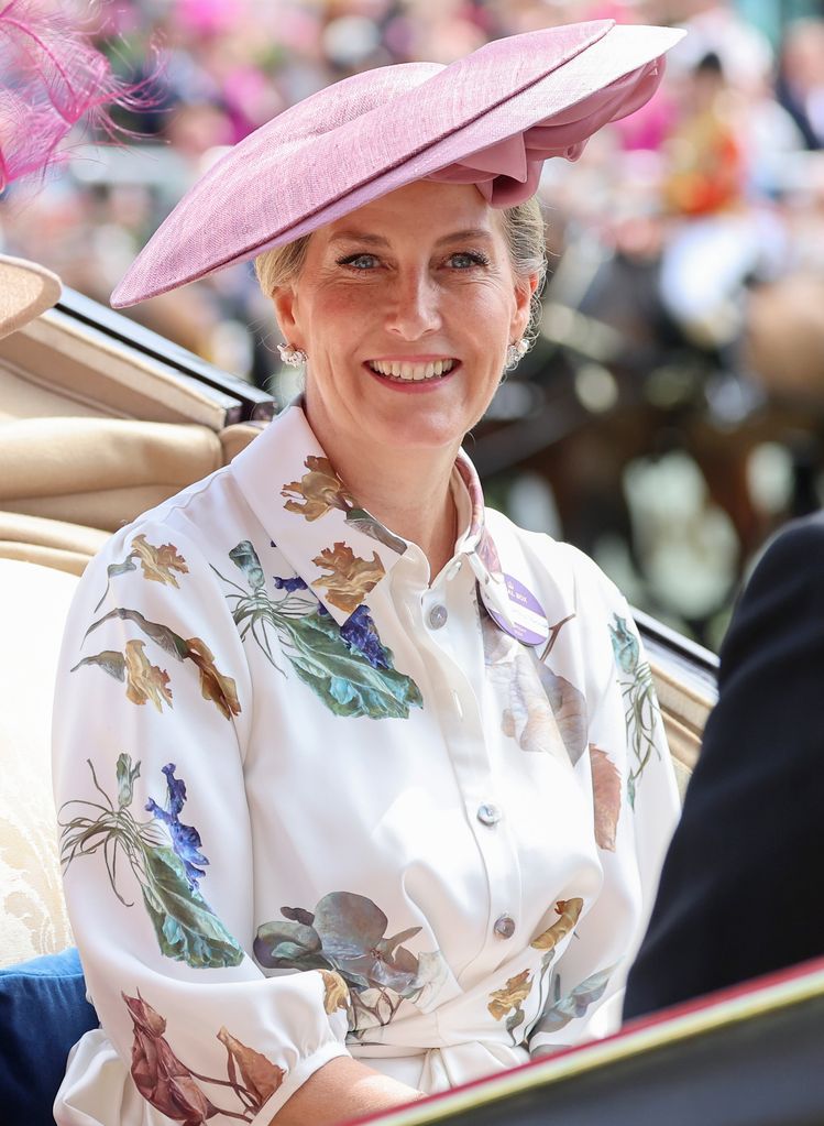Duchess of Edinburgh wearing floral shirt dress and pink hat