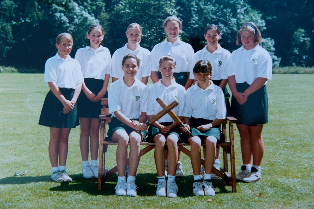 Kate, front row left, with her rounders team at St Andrew's School