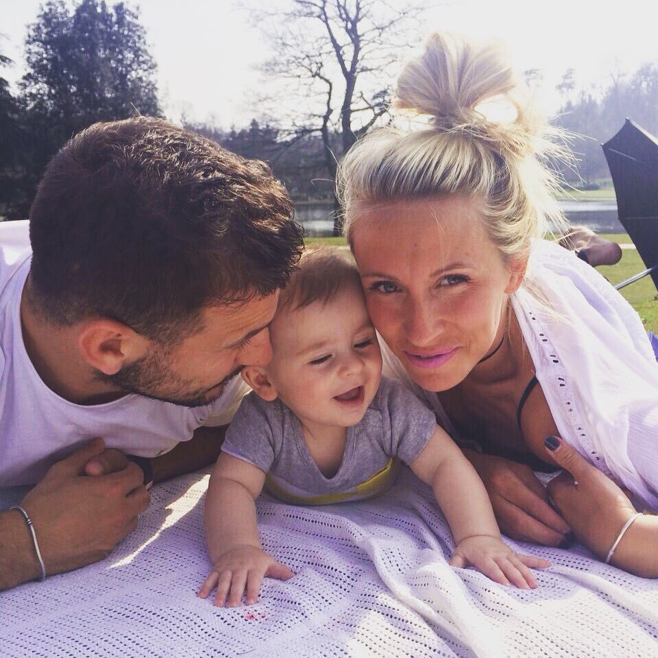danny and jodie with blake as baby on picnic blanket