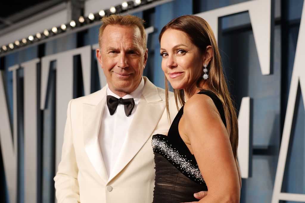 BEVERLY HILLS, CALIFORNIA - MARCH 27: (L-R) Kevin Costner and Christine Baumgartner attend the 2022 Vanity Fair Oscar Party hosted by Radhika Jones at Wallis Annenberg Center for the Performing Arts on March 27, 2022 in Beverly Hills, California. (Photo by Rich Fury/VF22/Getty Images for Vanity Fair)