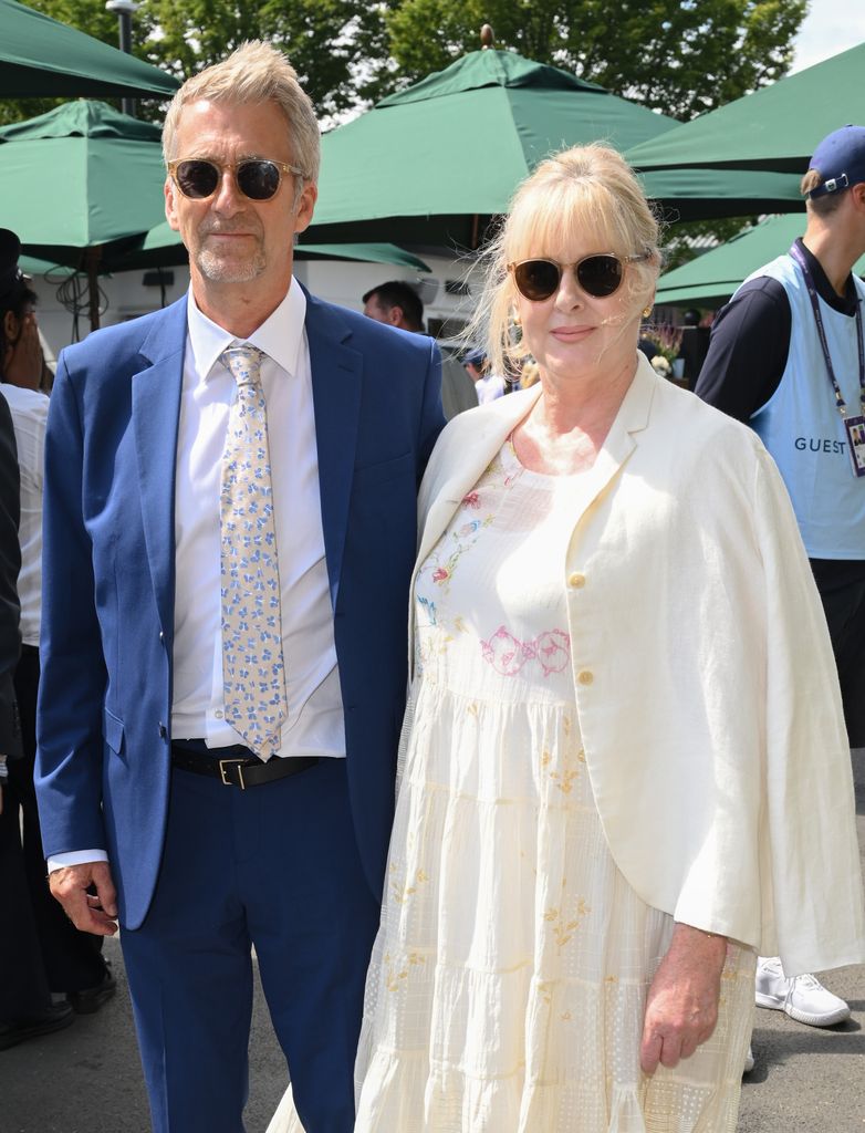 sarah lancashire posing with husband Peter Salmon at wimbledon