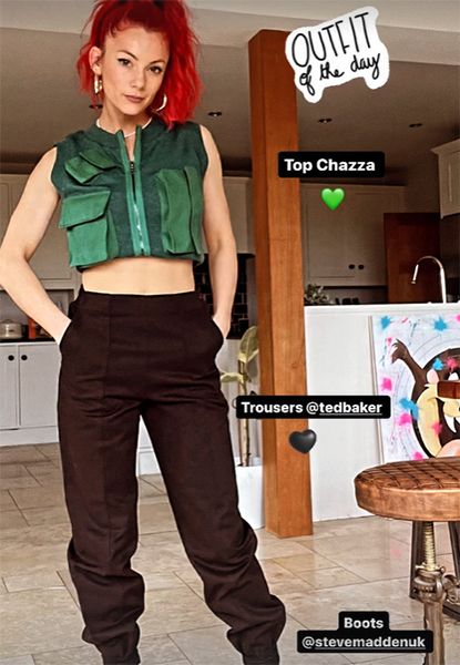 Dianne Buswell posing in crop top