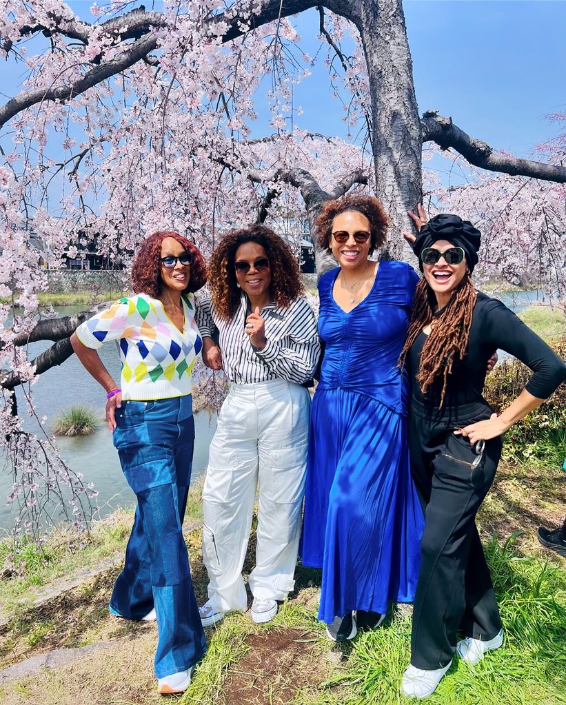 Oprah under cherry blossom tree with her girlfriends 
