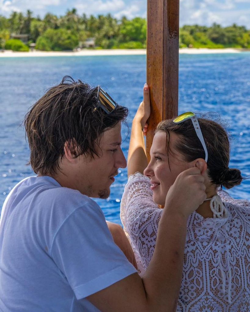 Jake shared a candid photo beside Millie to mark their engagement