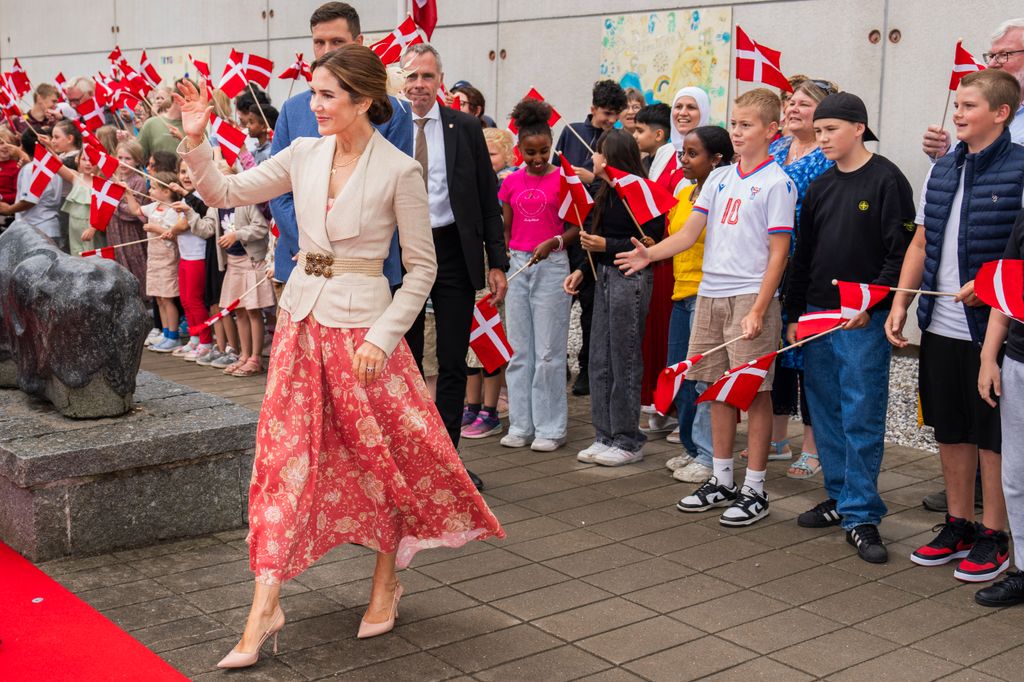 King Frederik X and Queen Mary greet children 