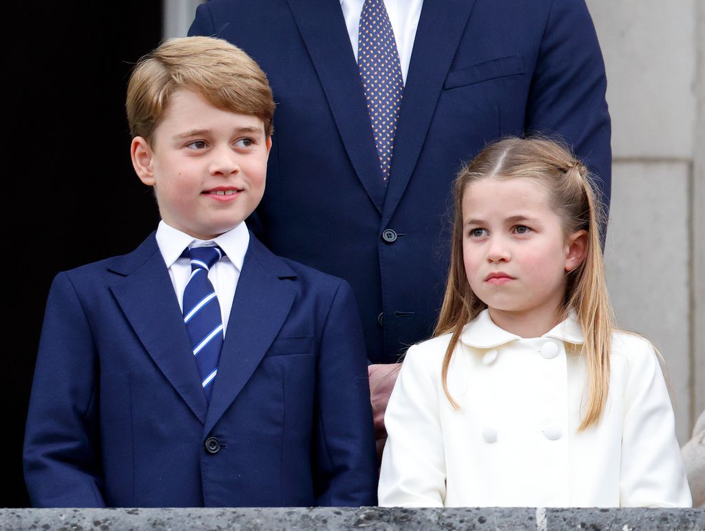 Prince George of Cambridge and Princess Charlotte of Cambridge stand on the balcony of Buckingham Palace following the Platinum Pageant on June 5, 2022