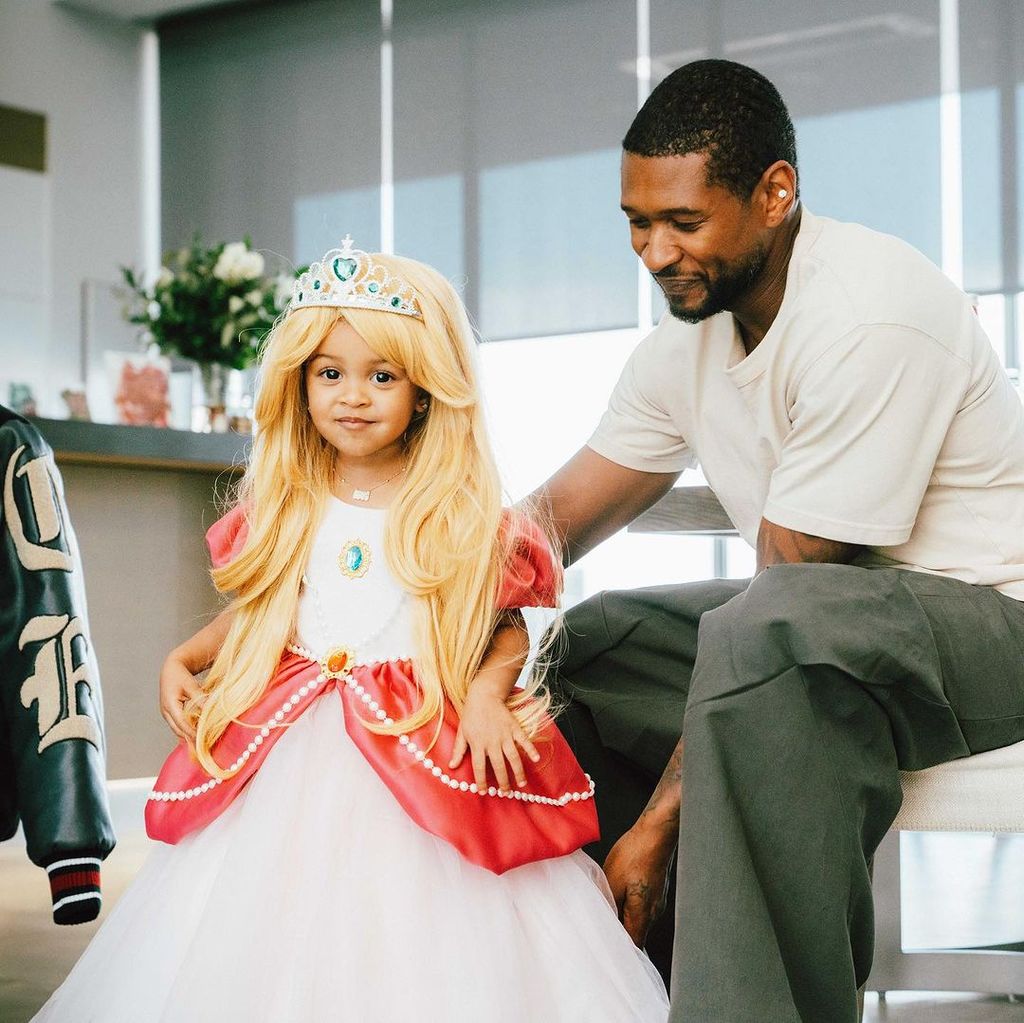 usher with daughter sovereign bo in costume