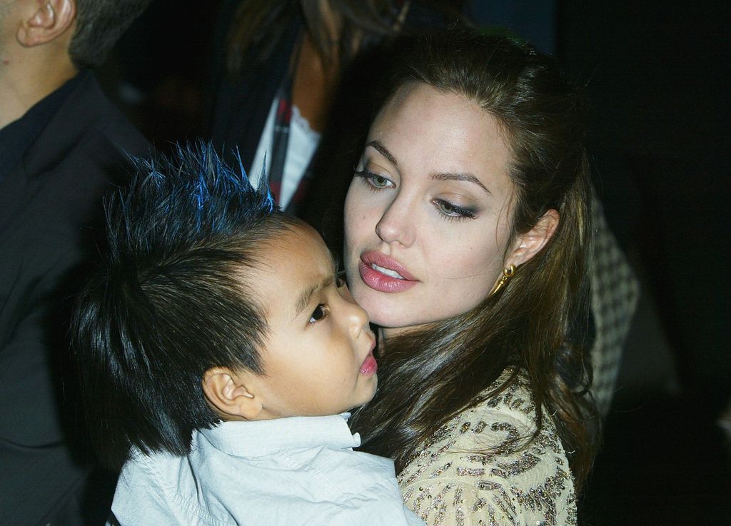 Angelina Jolie and her son Maddox attend the World Premiere of "Shark Tale" in 2004, two years after his adoption