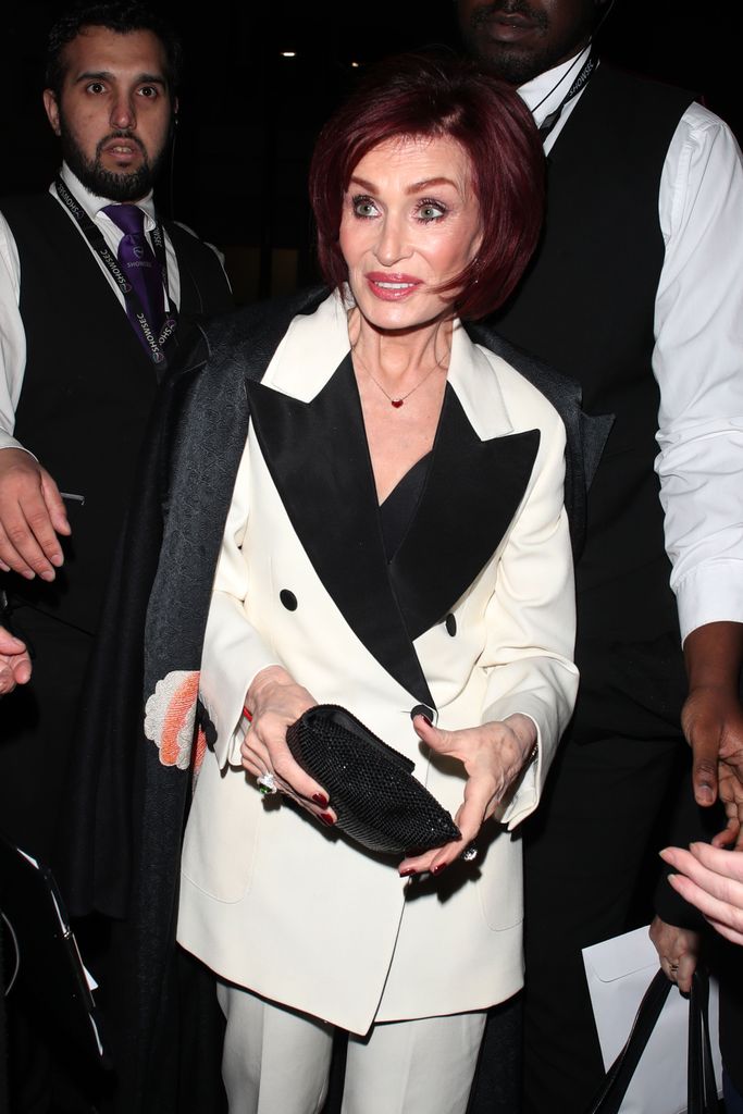 Sharon Osbourne in a white suit