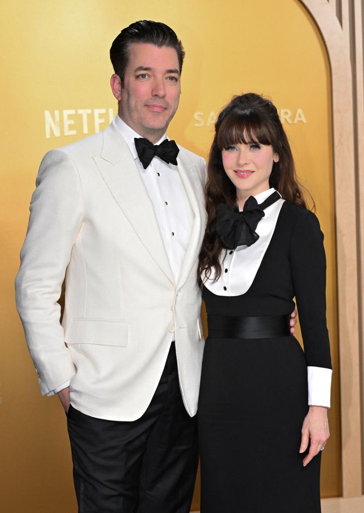 Jonathan Scott and Zooey Deschanel arrive for the 31st Annual Screen Actors Guild awards at the Shrine Auditorium in Los Angeles, February 23, 2025