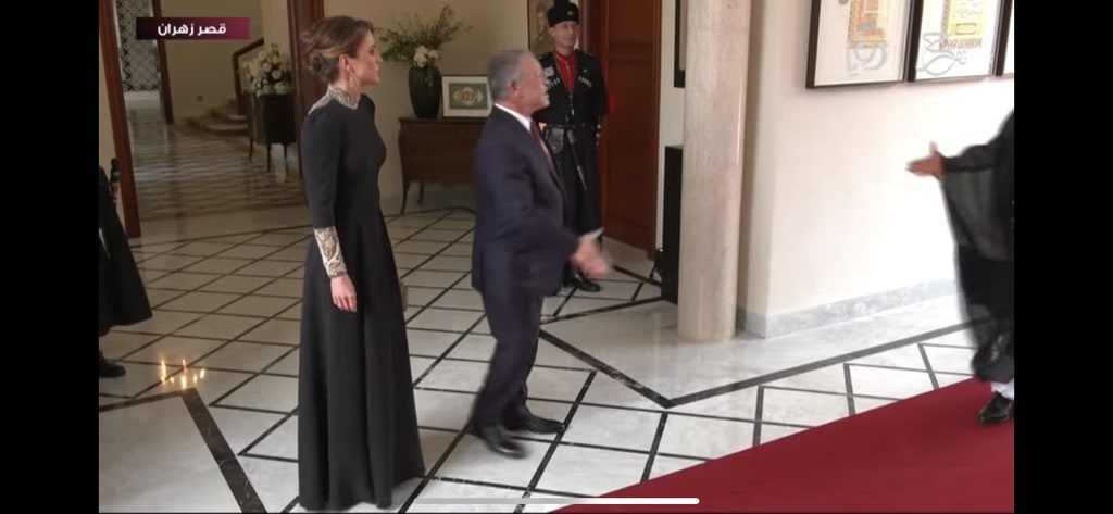 Queen Rania of Jordan full length shot of black Dior dress 