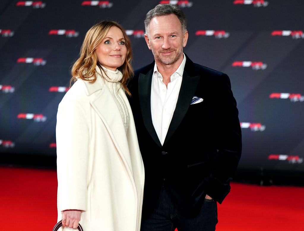 couple posing on red carpet