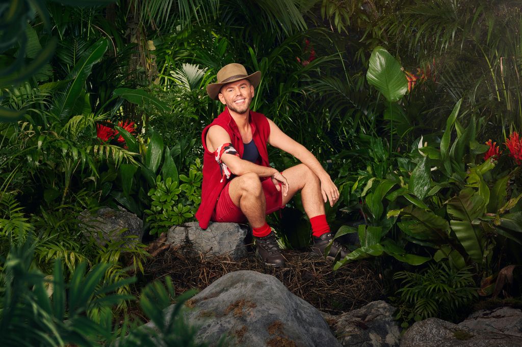 i'm a celeb contestant in red outfit 