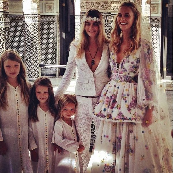 Joined by supermodel sister Cara, Poppy Delevingne said "I do" at the romantic hotel in Marrakech