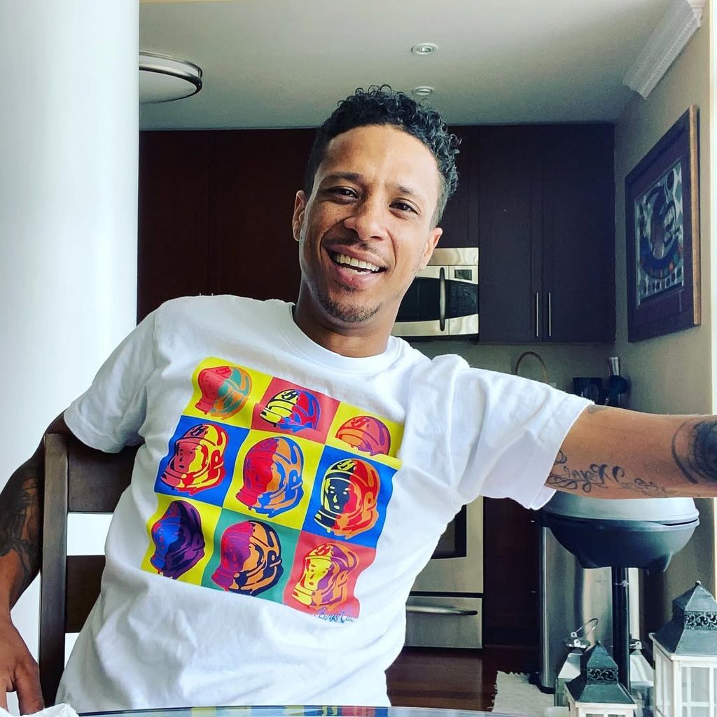 Floyd Roger Myers Jr. poses for a photo in his home, shared on Instagram