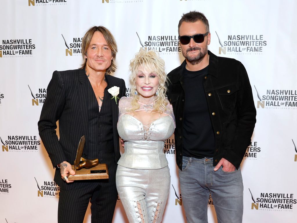 Keith Urban, Dolly Parton and Eric Church attend the 53rd Anniversary Nashville Songwriters Hall Of Fame Gala at Music City Center on October 11, 2023 in Nashville, Tennessee.