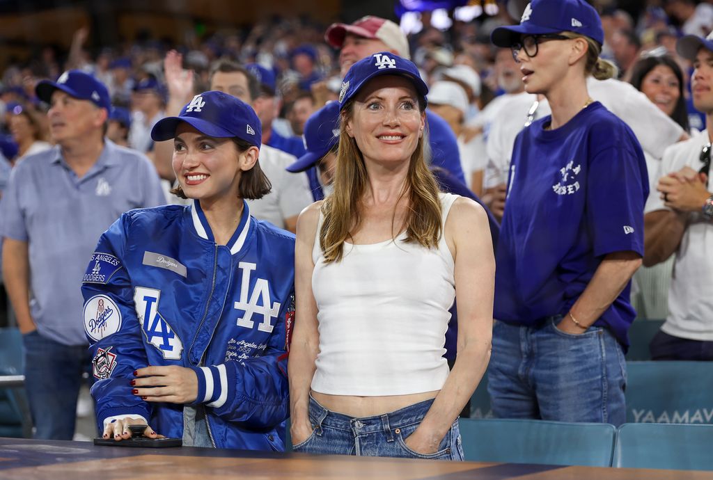 Maude Apatow and Leslie Mann watch game five of the 2025 World Series between the Toronto Blue Jays and the Los Angeles Dodgers at Dodger Stadium on October 29, 2025 in Los Angeles, California