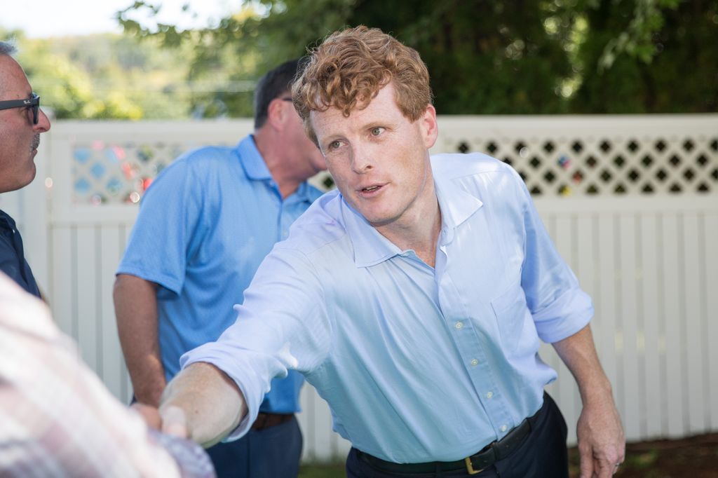 Rep. Joe Kennedy III shakes hands at State Rep. Dave Nangle's annual clambake on September 21, 2019 in Dracut, Massachusetts. Kennedy announced his campaign for Senator on Sunday morning.