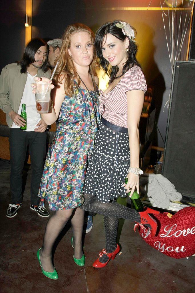 Katy Perry (R) and sister Angela dance at the Katy Perry After Show Party at the Postbahnhof on September 17, 2008 in Berlin, Germany.