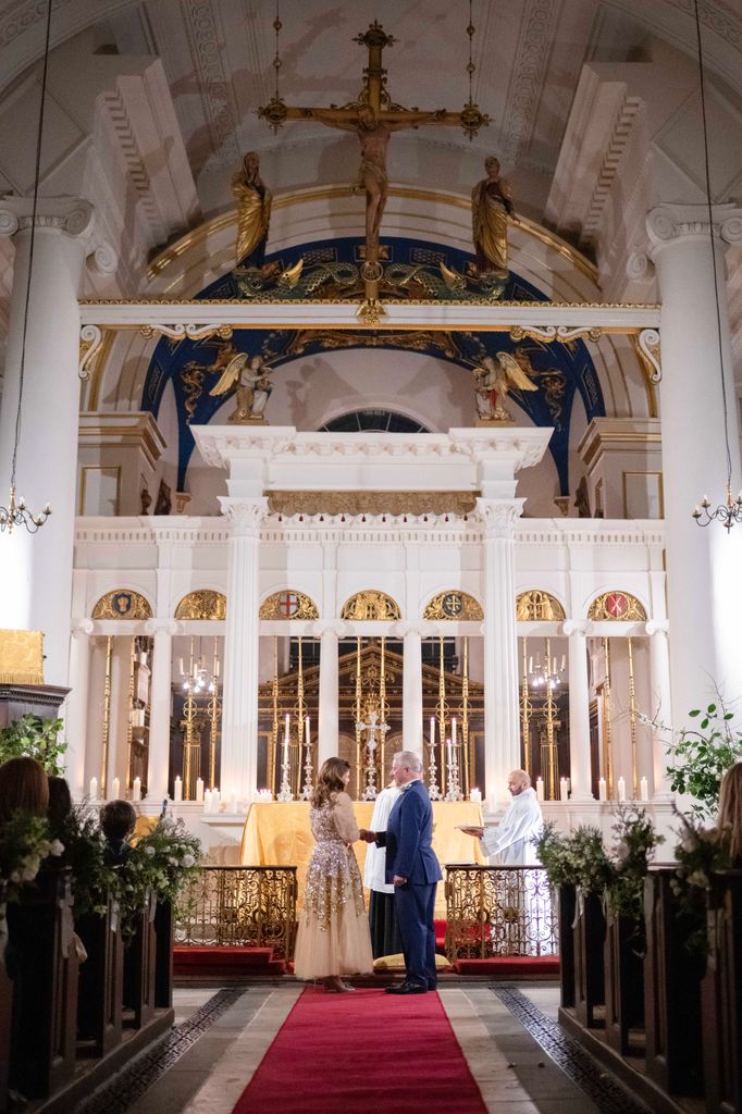 Kirstie Allsopp and Ben Andersen stand at the altar at Grosvenor Chapel in Mayfair