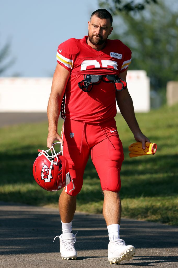 Travis Kelce #87 walks to the practice field during Kansas City Chiefs Training Camp at Missouri Western State University on August 05, 2025 in St Joseph, Missouri