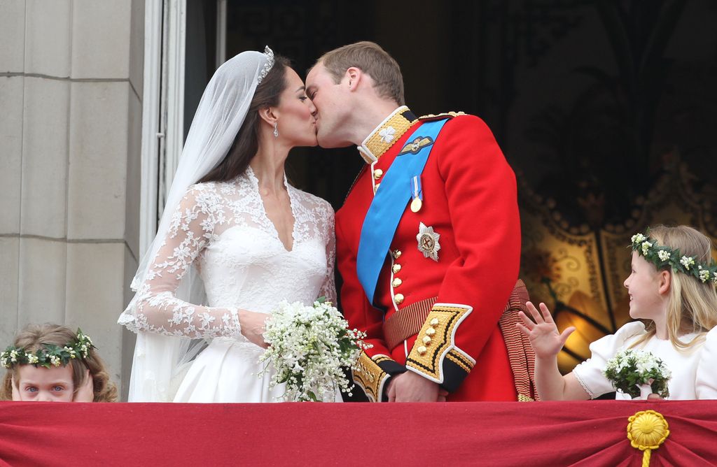 Kate Middleton and Prince William kissing with Grace Van Cutsem covering her ears