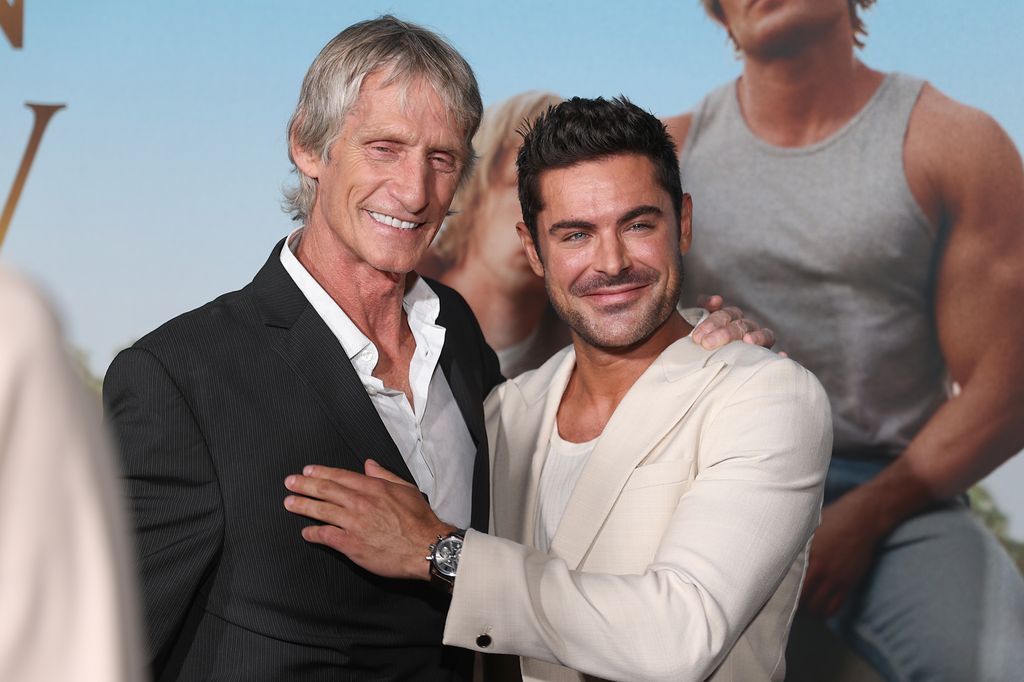 Retired American Professional Wrestler, Kevin Von Erich and Zac Efron are seen on the red carpet during "The Iron Claw" Dallas premiere at The Texas Theatre on November 8, 2023 in Dallas, Texas