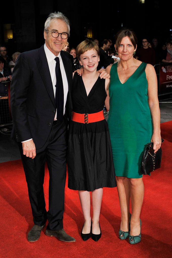 Larry Lamb and Clare Burt with their daughter