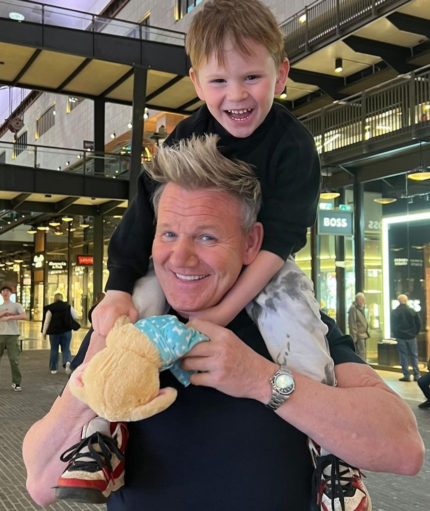 Gordon with his son Oscar on his shoulders