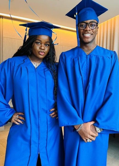 Mercy and David in their graduation gowns