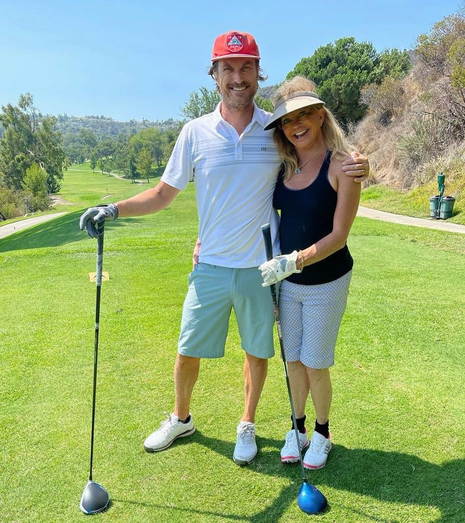 Goldie Hawn and Oliver Hudson golfing