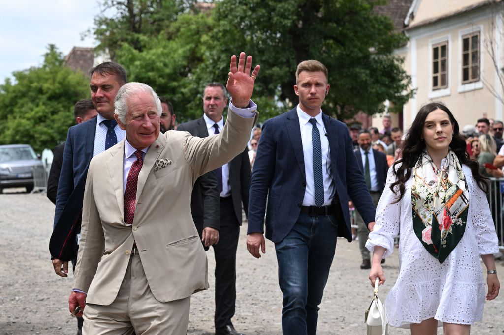 King Charles waving 