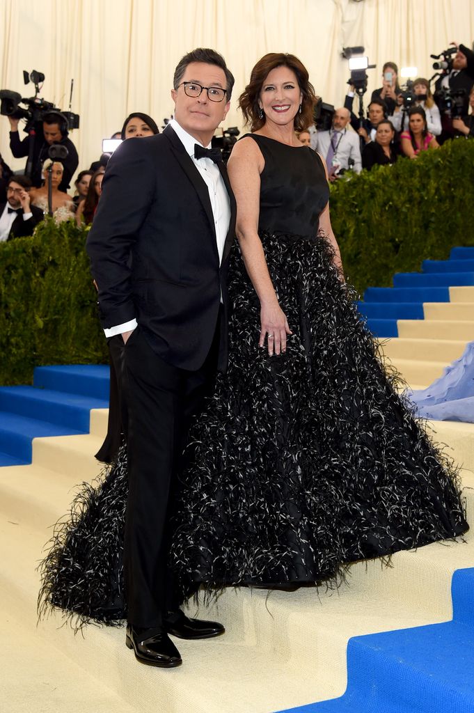stephen colbert and wife on red carpet at Met Gala 