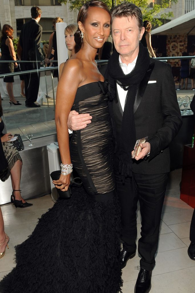 Iman in a strapless dress and David Bowie in a suit at the Council of Fashion Designers of America's 28th annual Fashion Awards at Lincoln Center's Alice Tully Hall