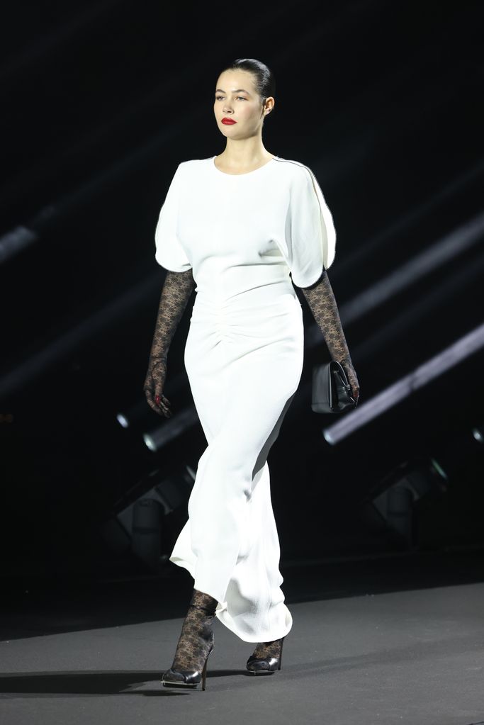 Grace Burns walks the runway at the LuisaViaRoma & British Vogue "Runway Icons" show at Piazzale Michelangelo on June 14, 2023 in Florence, Italy.