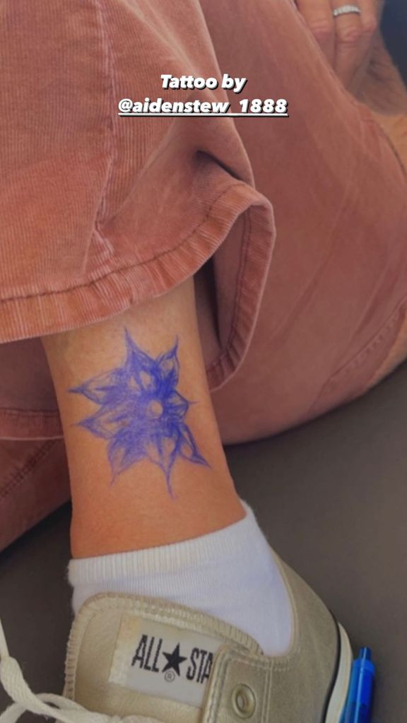 Penny Lancaster showed off a tattoo drawn her son on her leg