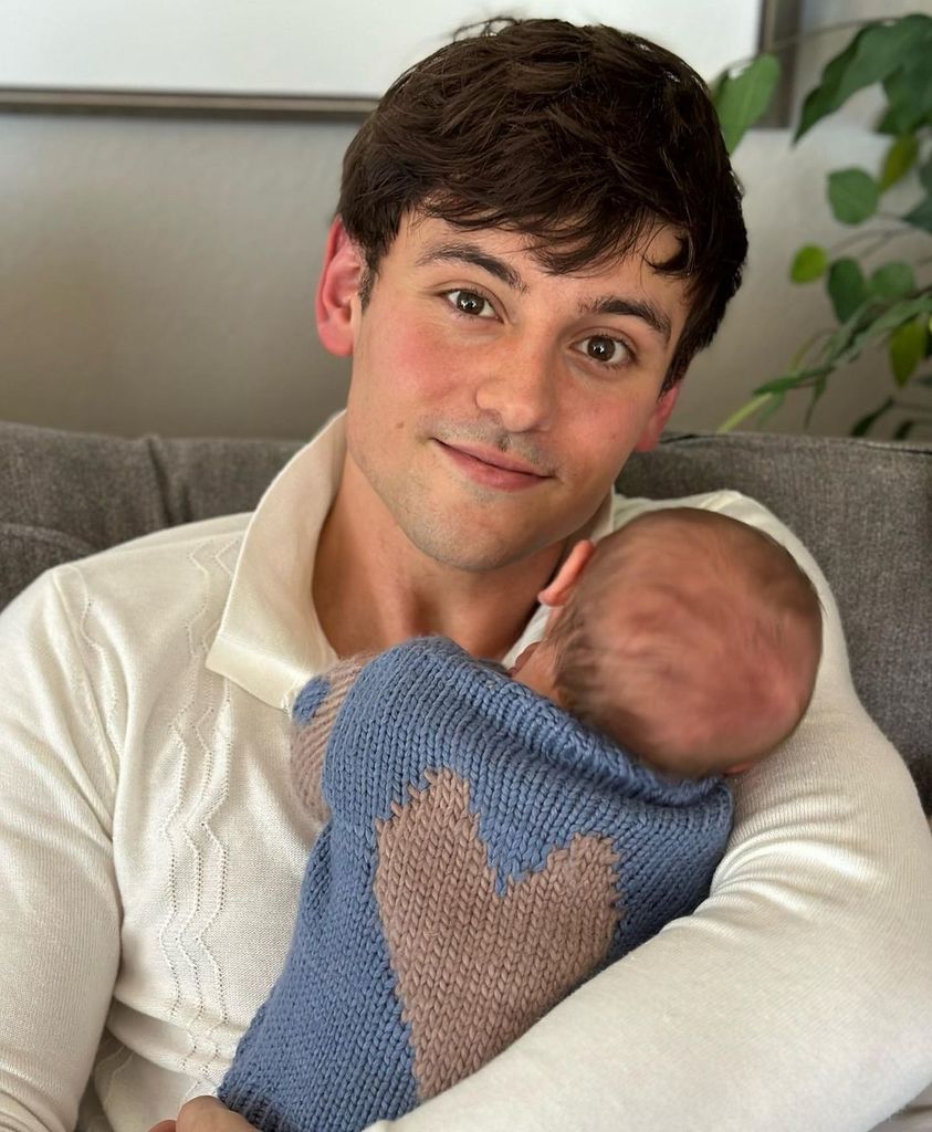 Tom Daley introducing his baby son Phoenix