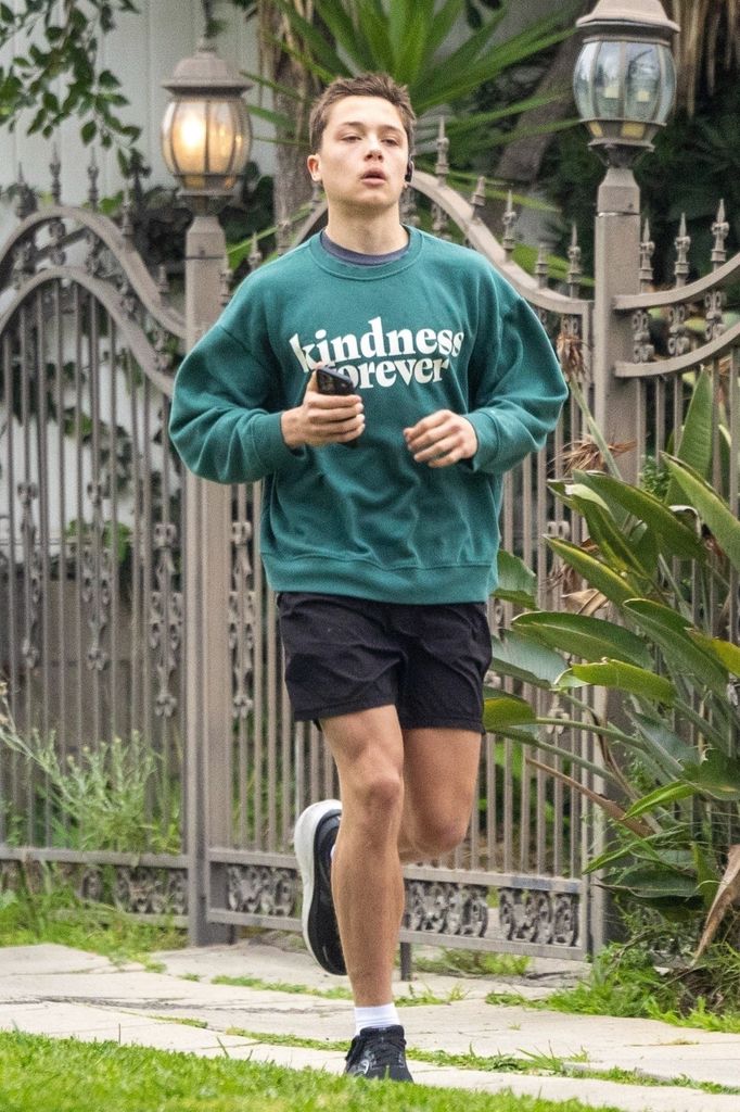 Knox shows off his fitness as he runs in LA