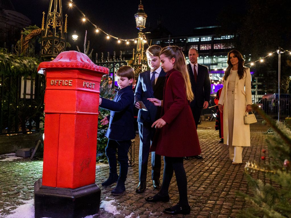 George, Charlotte and Louis post letters