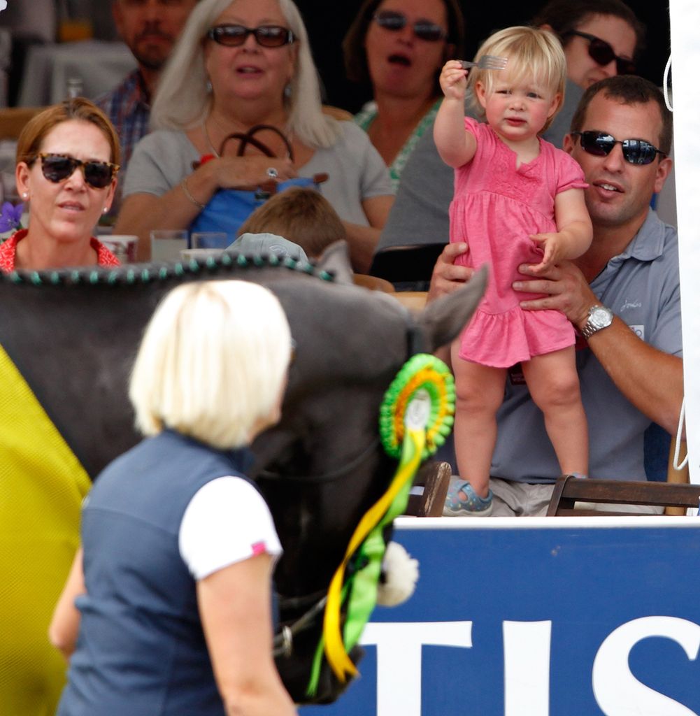 Peter holds up niece Mia at Festival of British Eventing