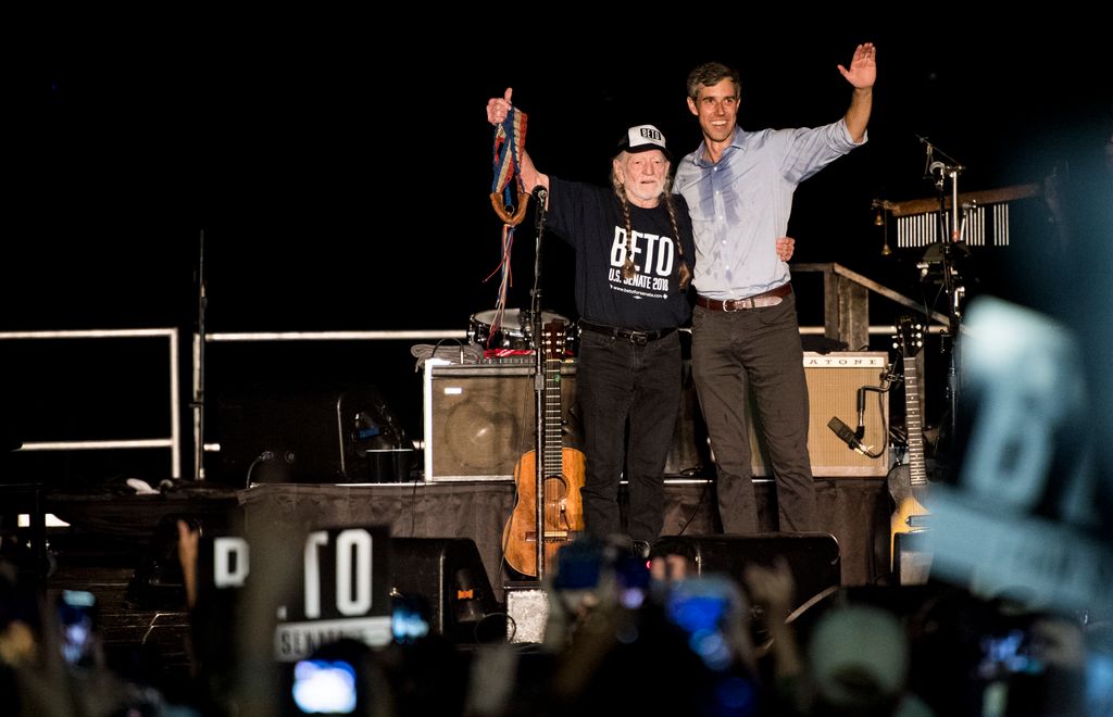 Democratic candidate for U.S. Senate from Texas Rep. Beto O'Rourke joins Willie Nelson on stage during his Turn out For Texas Rally, featuring a concert by Wille Nelson, in 2018