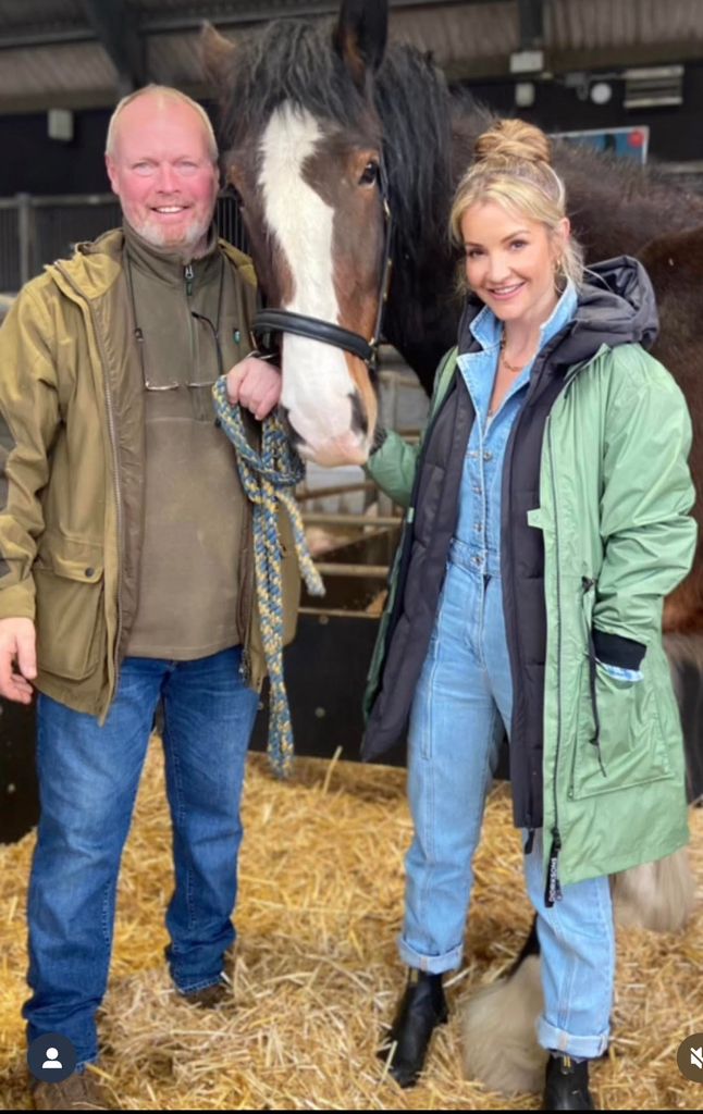 Helen Skelton posing with a horse