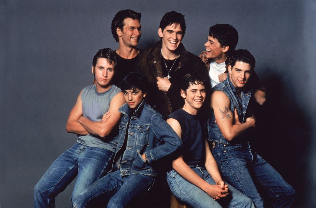 Patrick Swayze, Matt Dillon, Rob Lowe, Emilio Estevez, Ralph Macchio, Thomas C. Howell, and Tom Cruise on the set of The Outsiders