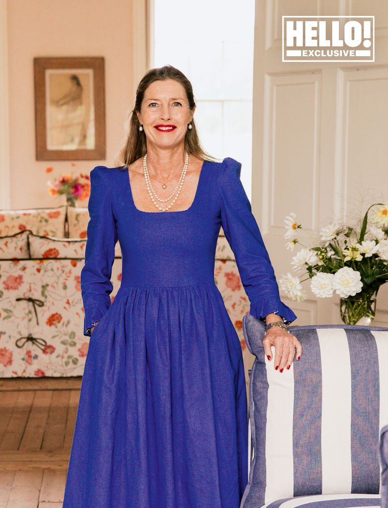 Sophie Conran in blue dress posing in Conran home