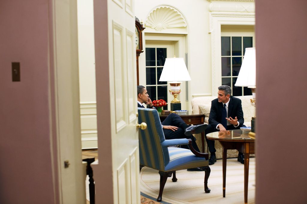 President Barack Obama meets with actor George Clooney in the  Oval Office in February 2009 