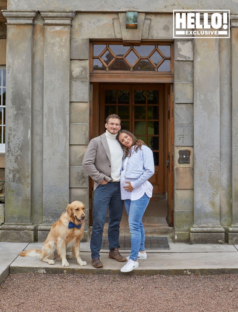 Matthew Kinloch and Johanna Squiban posing with pet dog outside Gilmerton House