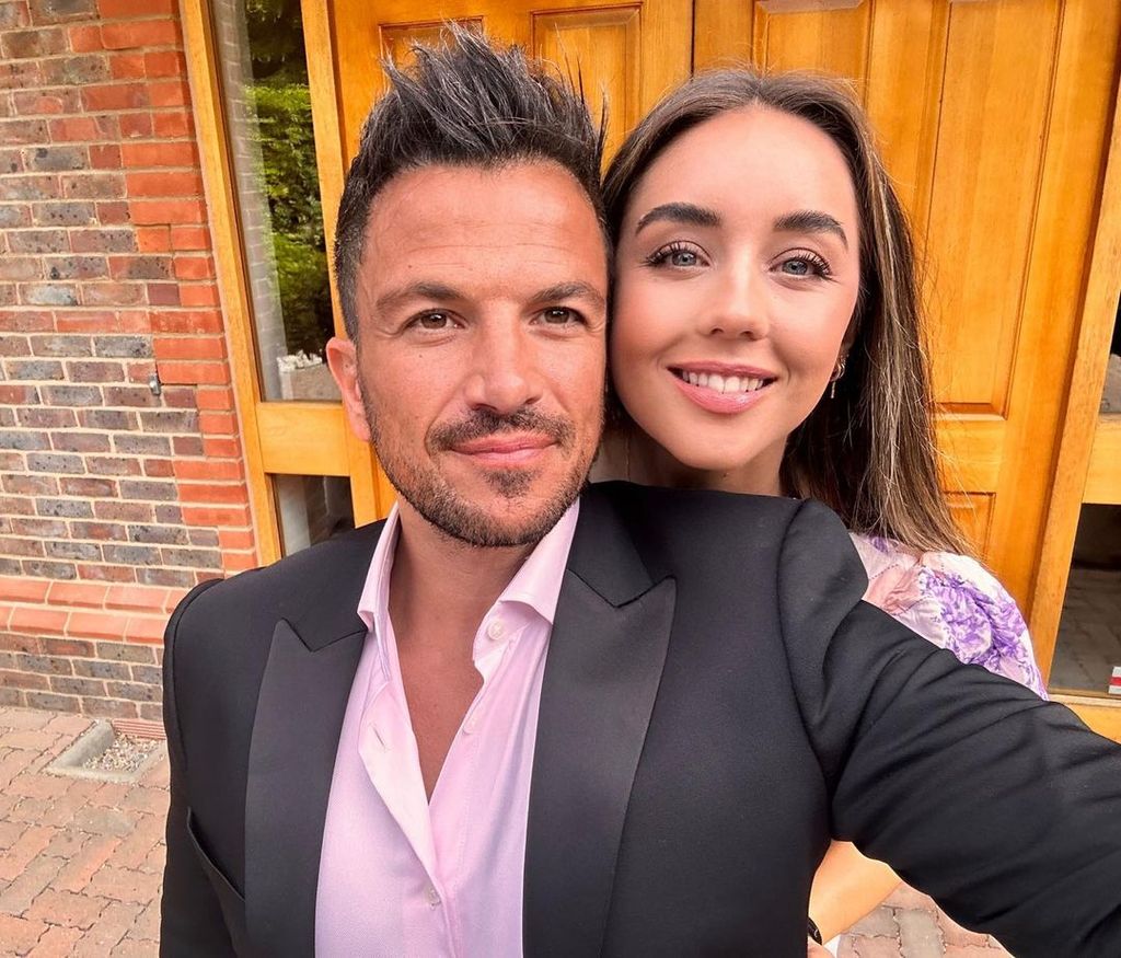 Emily Andre and Peter Andre smiling for a selfie