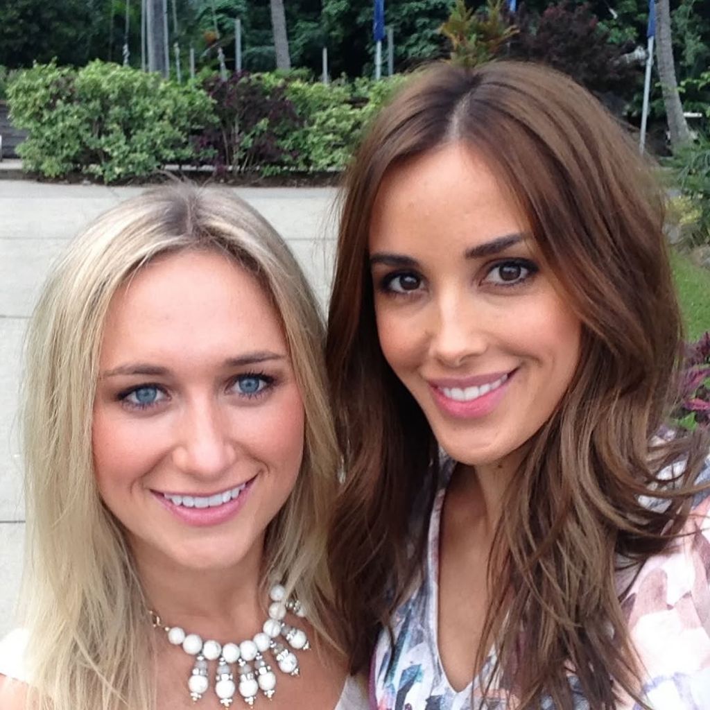 Lucy Mills and Rebecca Judd smile for the camera