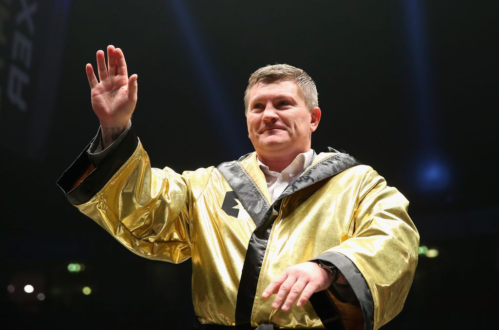 boxer wearing gold robe 